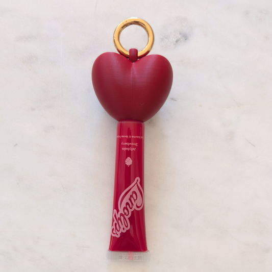 Lip Balm Helmet attached to keychain – stylish lip balm holder keychain in red heart 